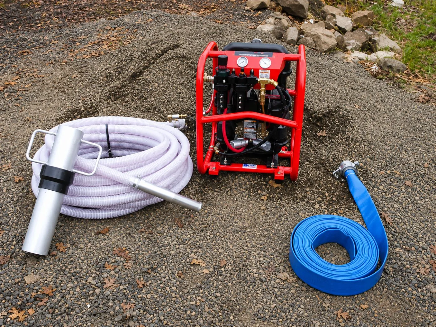 The Dryrite DRE-80 pump with its full suction and discharge hose kit